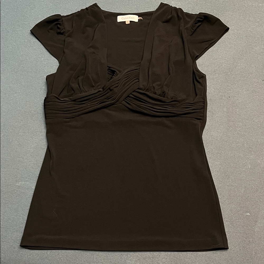 Cute crisscross neckline, cap sleeves